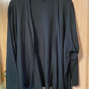 Black long sleeve never worn size is 4x but It was to big on me.